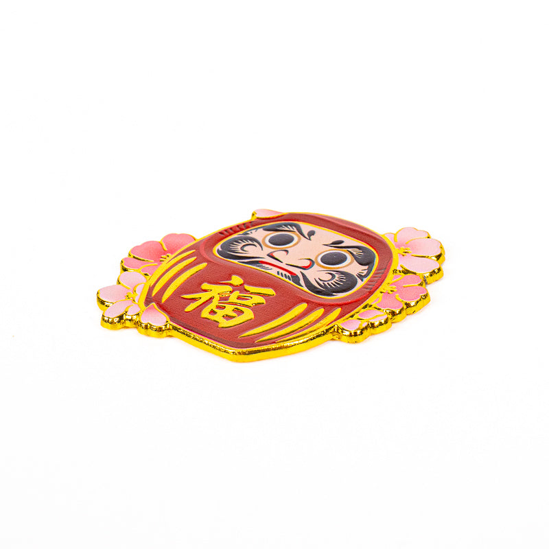 Japanischer Metallmagnet Daruma und Sakura