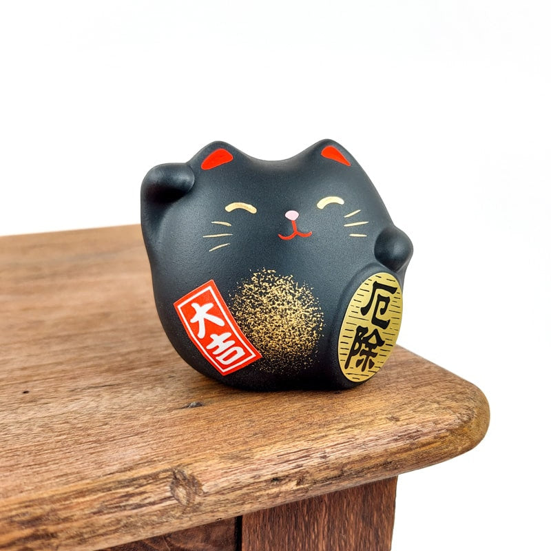 Schwarze Runde Maneki Neko Glückskatze