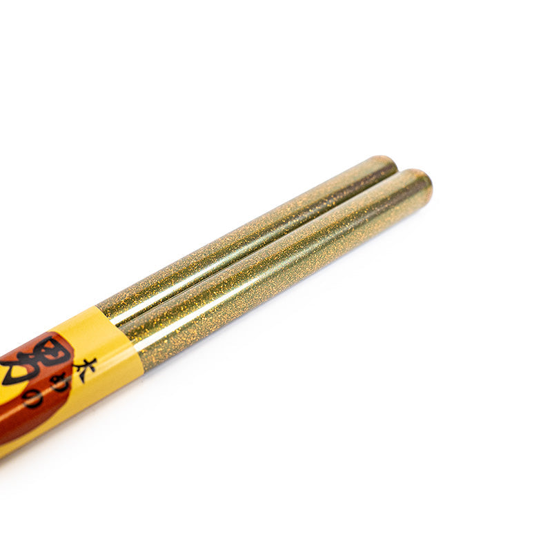 Dicke japanische Essstäbchen mit goldenen Pailletten