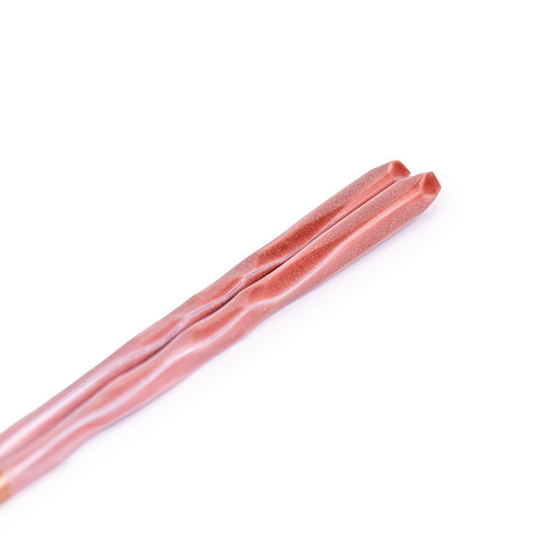 Gewellte japanische Essstäbchen in Rosa mit Glitzer
