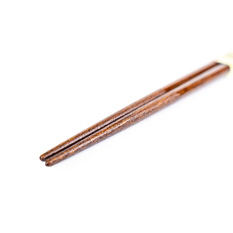 Japanische Essstäbchen aus Holz mit goldenem Muster