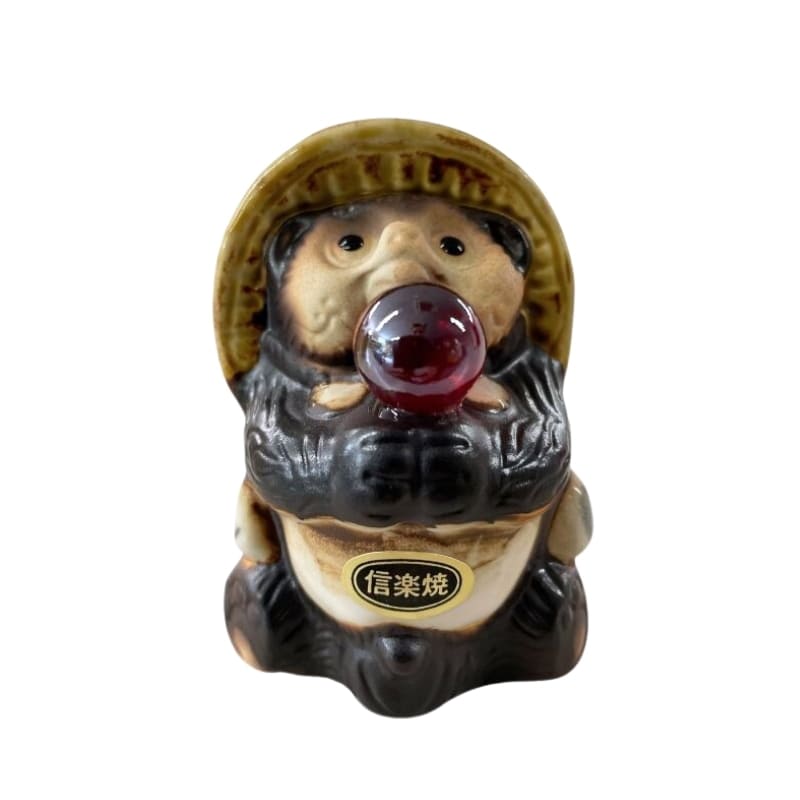 Statue Tanuki Rote Perle